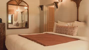 Premium bedding, down comforters, memory foam beds, minibar