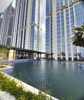 Outdoor pool - Relaxing place with sea view at Pollux Habibie A2 2502 (Batam)