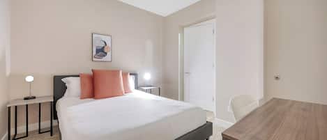 1 bedroom, desk, iron/ironing board, travel crib