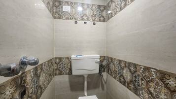 Deluxe Double Room, City View | Bathroom | Free toiletries, slippers, towels, soap
