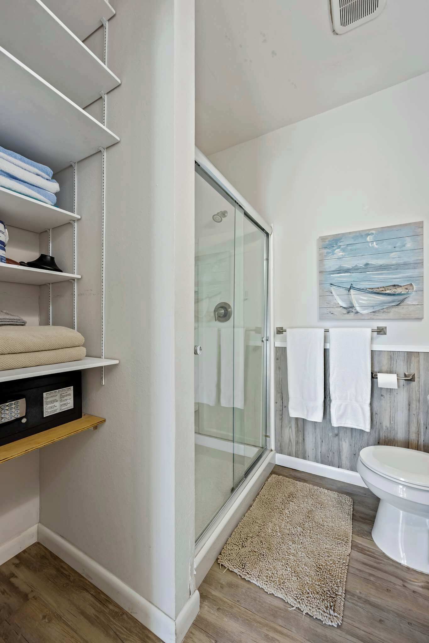 Shower, hair dryer, towels, shampoo