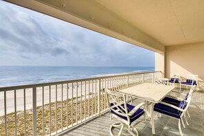 A balcony with a view of the beach and ocean. - Beachfront Navarre Condo w/ Balcony, Walk to Ocean (Navarre)