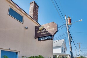 A building with a sign reading 'The Beachfront Condomotel.'