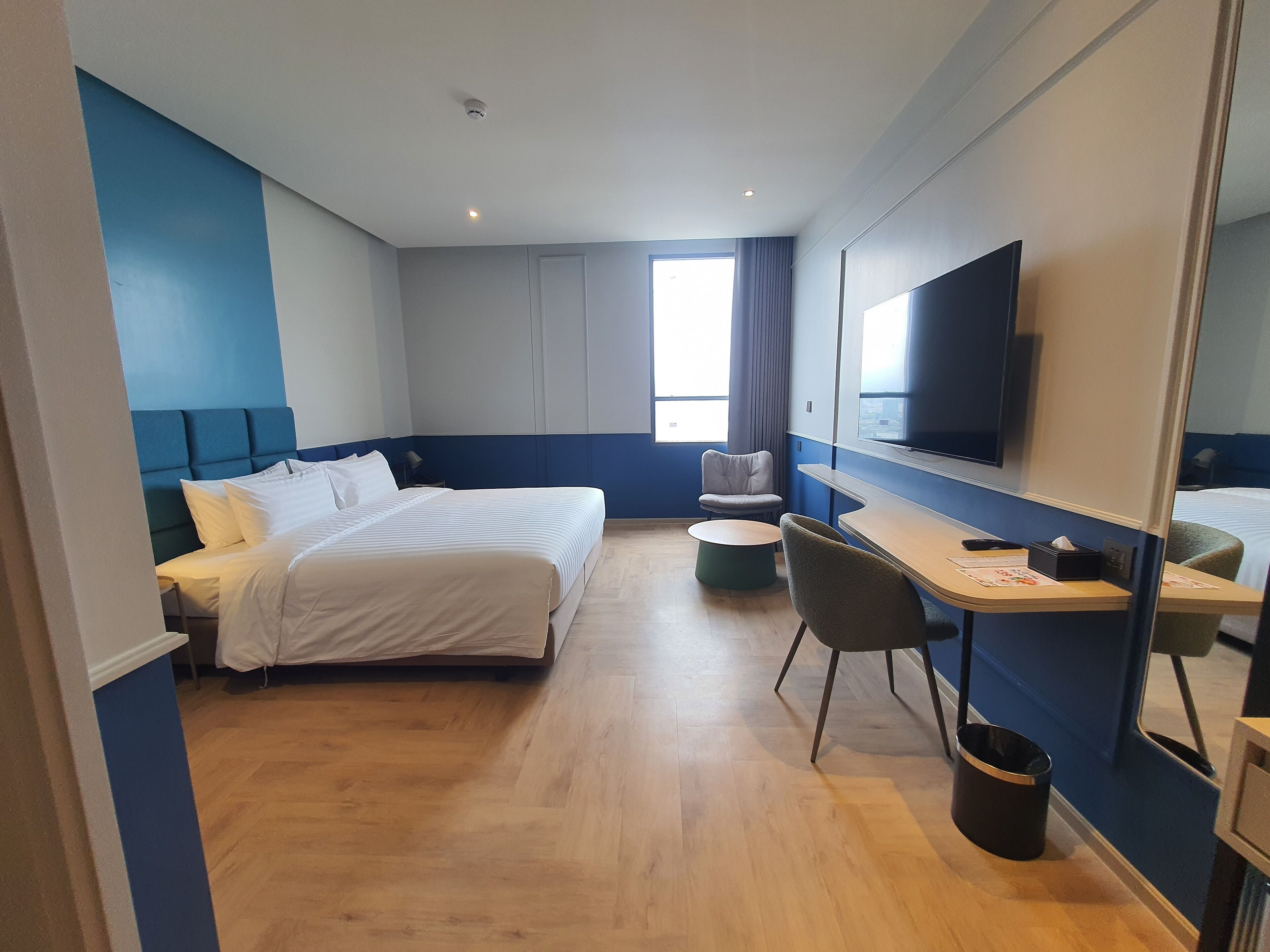 Superior Studio, 1 King Bed, City View | Minibar, in-room safe, laptop workspace, blackout curtains