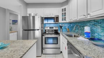 Condo, 1 King Bed with Sofa bed, Balcony, Ocean View (Jetty East 404A) | Private kitchen | Fridge, microwave, oven, stovetop