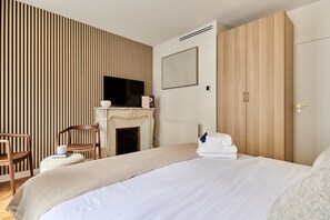 2 habitaciones, tabla de planchar con plancha, wifi y ropa de cama
