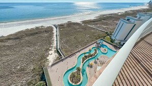 A resort with a pool area, beach access, and a view of the ocean. - 4BR Beachfront, Lazy River w/ Slide, New to Market!! (Orange Beach)