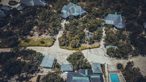 An aerial view of a residential area with multiple houses, a swimming pool, and a well-maintained garden. - Room in Guest Room - Mmakuba Private Game Lodge, Superior Suite 4 (Mookgopong)