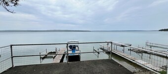 Charming 2-bedroom cabin sits on 2.5 acres on Hubbard Lake.