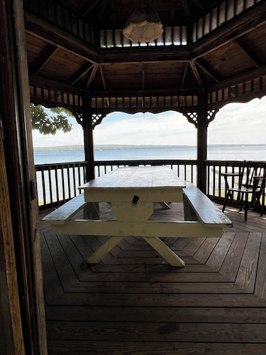 Charming 2-bedroom cabin sits on 2.5 acres on Hubbard Lake.