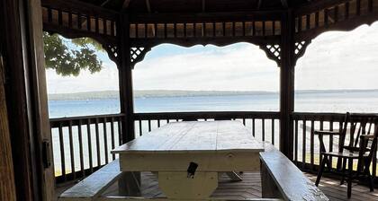 Charming 2-bedroom cabin sits on 2.5 acres on Hubbard Lake.