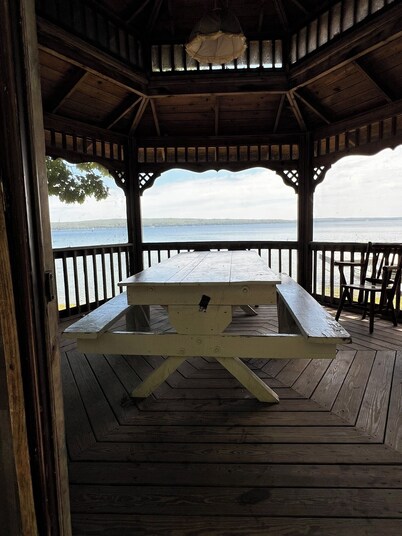 Charming 2-bedroom cabin sits on 2.5 acres on Hubbard Lake.