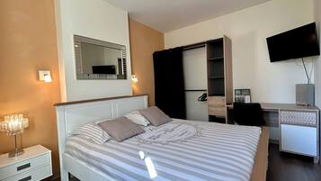 1 chambre, fer et planche Ă repasser, Wi-Fi, draps fournis