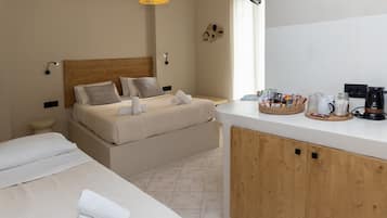 1 bedroom, desk, iron/ironing board, travel crib