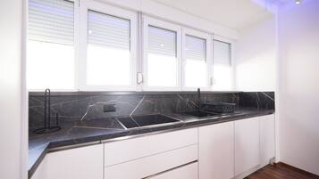 Superior Apartment, City View | Private kitchen | Electric kettle