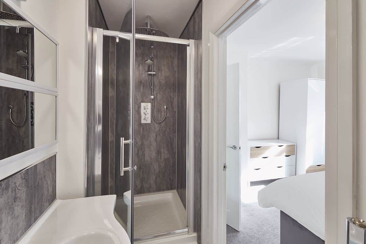 Shower, eco-friendly toiletries, hair dryer, towels