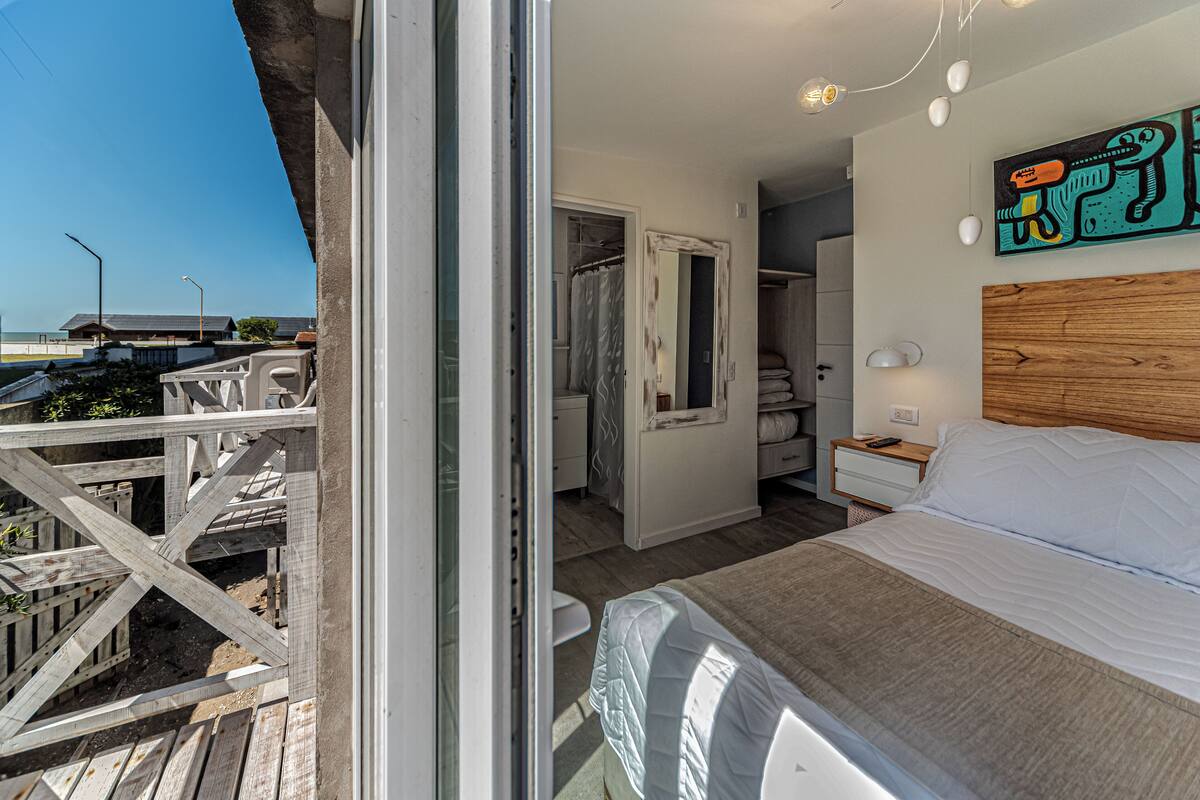Premium maisonnette, balkon, uitzicht op strand | Luxe beddengoed, een kluis op de kamer, verduisterende gordijnen