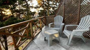 Premium Quadruple Room, Balcony, City View | Terrace/patio