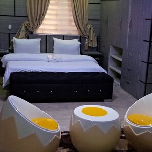 Family Room, Balcony, City View | Desk, laptop workspace, iron/ironing board, free WiFi - Doncont Homes and Apartments (Yenagoa)