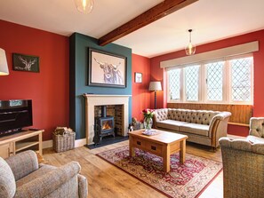 Fireplace - Escape to this charming, beautifully restored stone cottage in Cowesby. (Cowesby, near Thirsk)