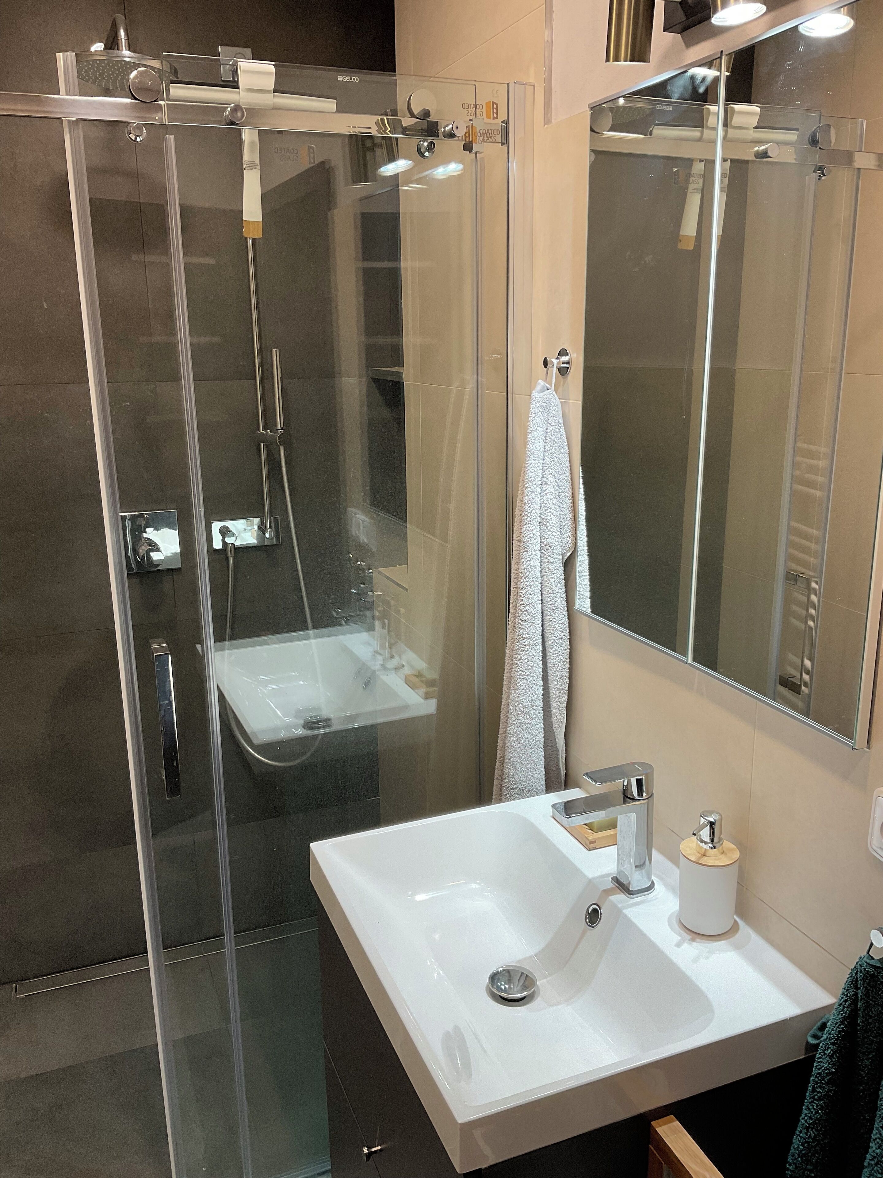 Shower, towels, soap, toilet paper