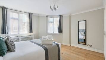 Premium bedding, memory-foam beds, blackout curtains, iron/ironing board