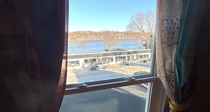 Historical riverfront home in beautiful LeClaire. Kid and pet friendly!