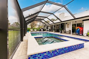 Outdoor pool, a heated pool - Beautiful 4-bedroom House in Charming Location - Heated Pool - Near Beach (Nokomis)