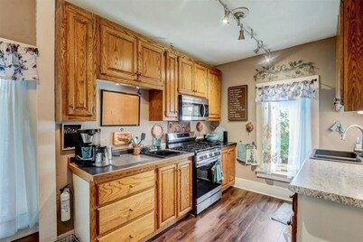 Relax & Reboot in this Charming 2-Bedroom Townhome 
