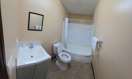 Family Double Room, City View | Bathroom | Combined shower/tub, towels, soap, toilet paper. Candle Light Motel