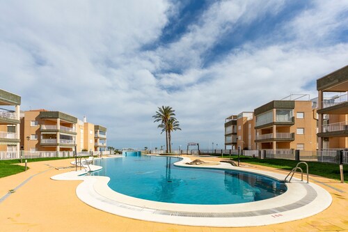 Appartement 'Al Lado De La Playa' avec vue mer, piscine commune et Wi-Fi