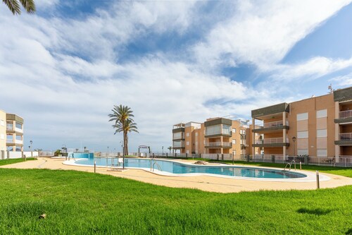Apartment 'Al Lado De La Playa' with Sea View, Shared Pool and Wi-Fi