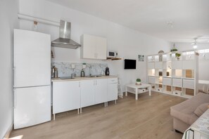 Fridge, microwave, stovetop, coffee/tea maker