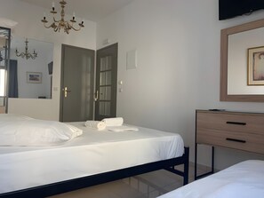 1 chambre, fer et planche à repasser, Wi-Fi gratuit, draps fournis