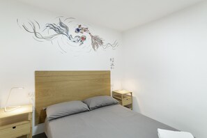 1 habitación, tabla de planchar con plancha, wifi gratis y ropa de cama 