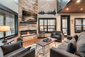 Smart TV, fireplace - Bluff Mountain Retreat: New and Modern w/ Indoor Pool and 3 En Suite Bedrooms (Sevierville)