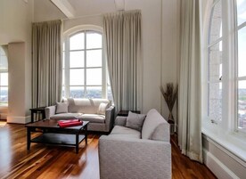 Deluxe Apartment, City View | Living area | 32-inch Smart TV with cable channels