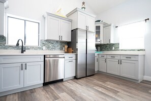 Private kitchen - Charming 2-bedroom condo steps from Beach, Library and Grocery on Longboat Key (Longboat Key)