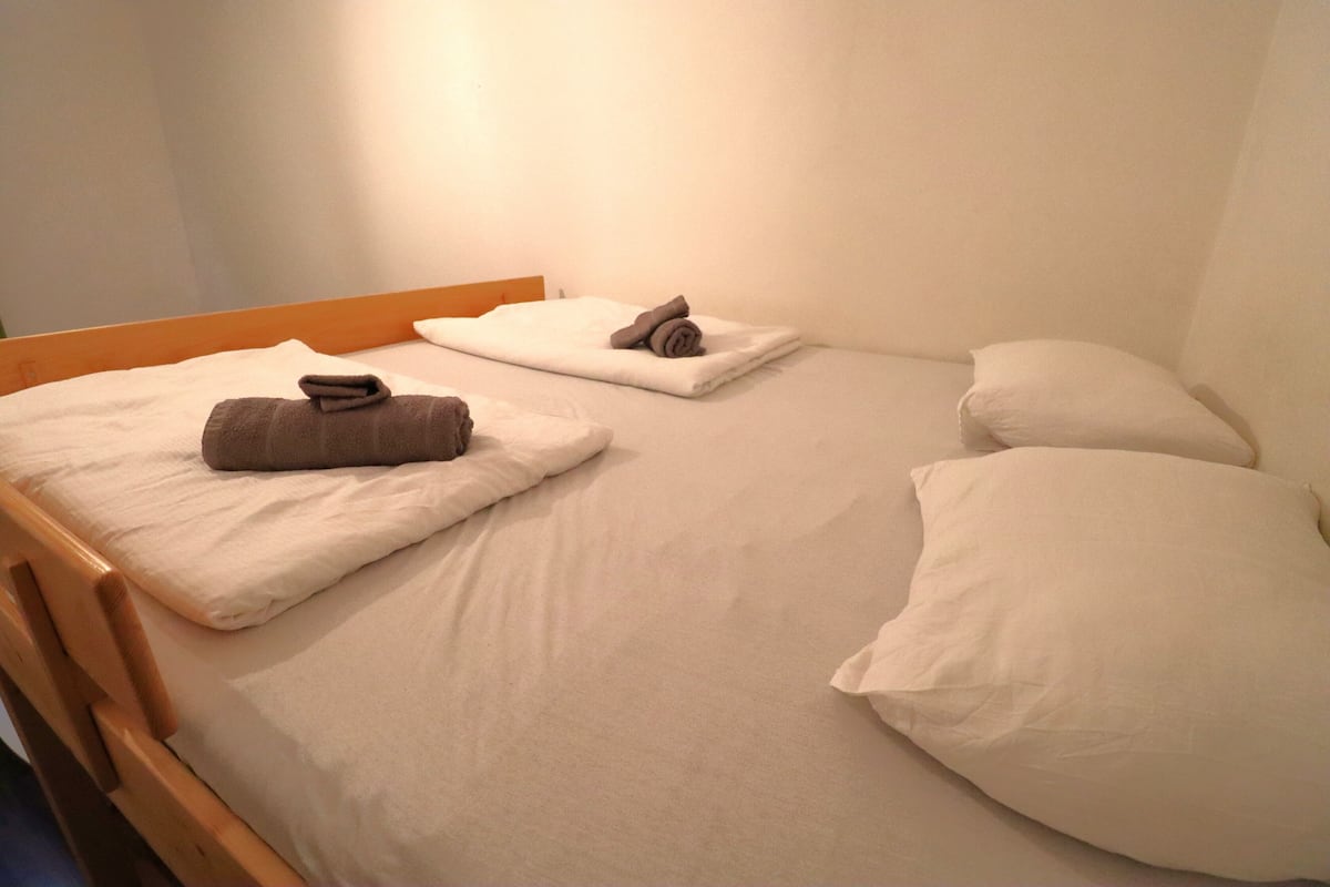 Deluxe Apartment, Kitchen, Courtyard View | 2 bedrooms, desk, laptop workspace, iron/ironing board