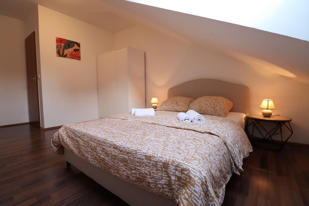 Deluxe Apartment, Kitchen, Courtyard View | 2 bedrooms, desk, laptop workspace, iron/ironing board