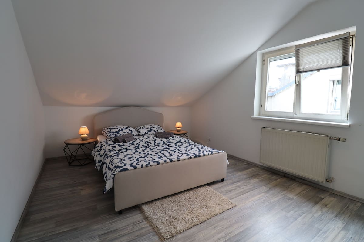 Deluxe Apartment, Kitchen, Courtyard View | 2 bedrooms, desk, laptop workspace, iron/ironing board