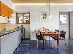 Fridge, oven, cookware/dishes/utensils