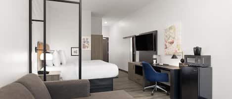 Suite, 1 King Bed with Sofa bed, Accessible, Non Smoking (Mobility, Tub w/ Grab Bars) | Desk, laptop workspace, blackout drapes, iron/ironing board