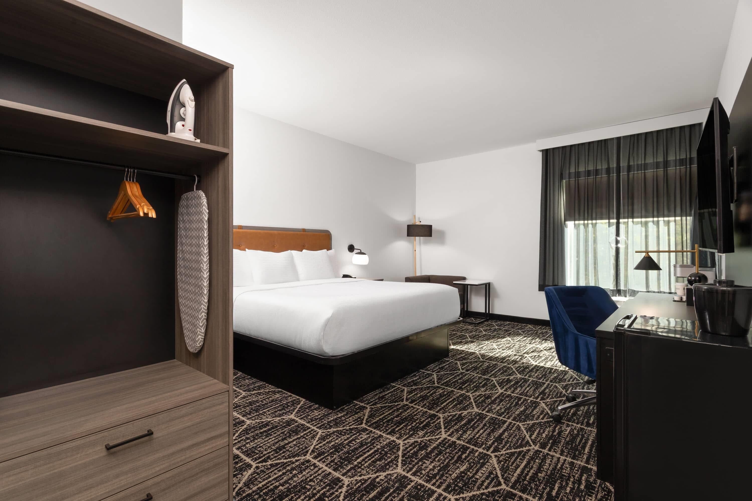 Room, 1 King Bed, Accessible, Non Smoking (Mobility, Bathtub w/ Grab Bars) | Desk, laptop workspace, blackout drapes, iron/ironing board