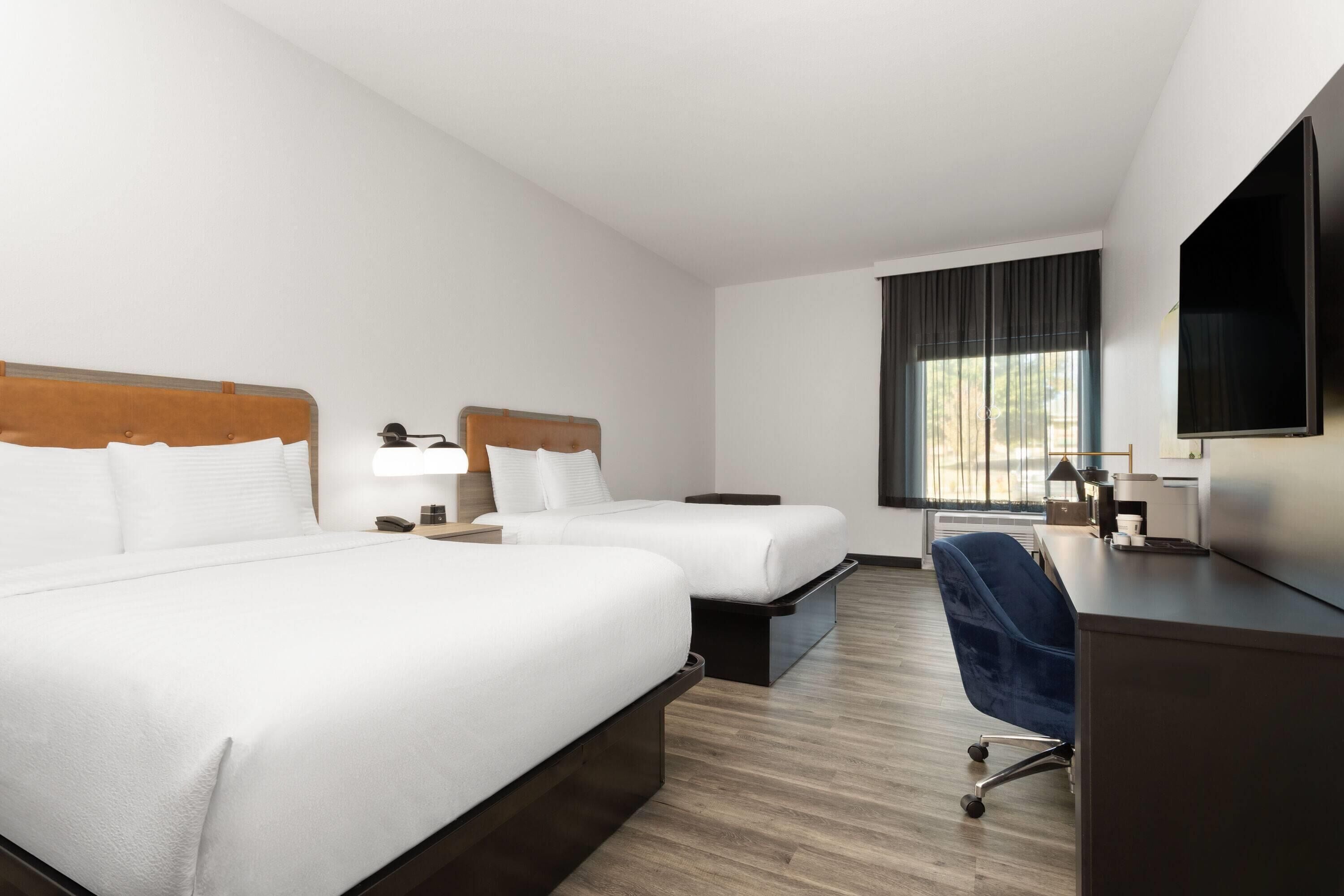 Room, 2 Queen Beds, Accessible, Non Smoking (Mobility, Bathtub Grab Bars) | Desk, laptop workspace, blackout drapes, iron/ironing board