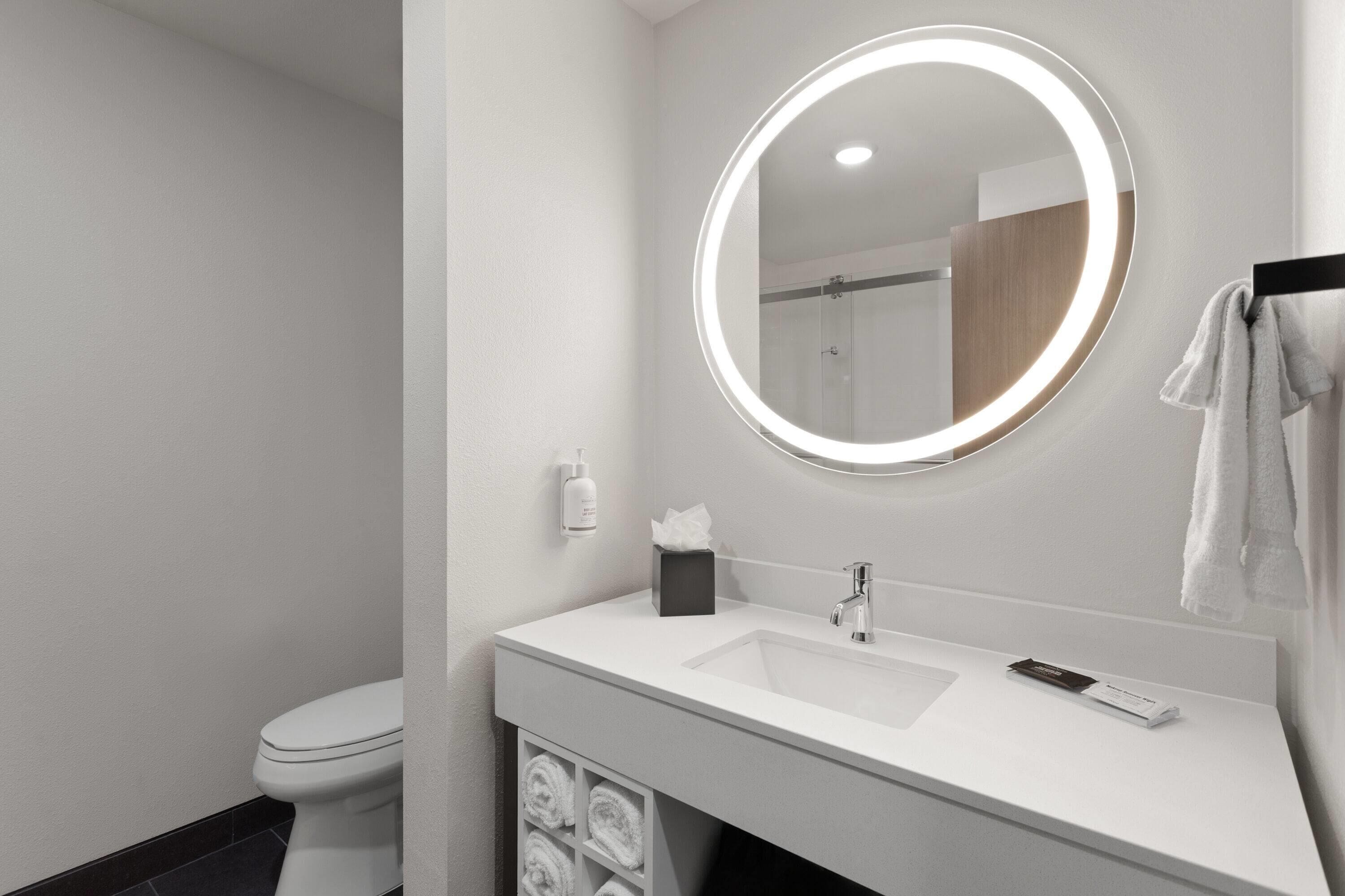 Hair dryer, towels, shampoo, toilet paper