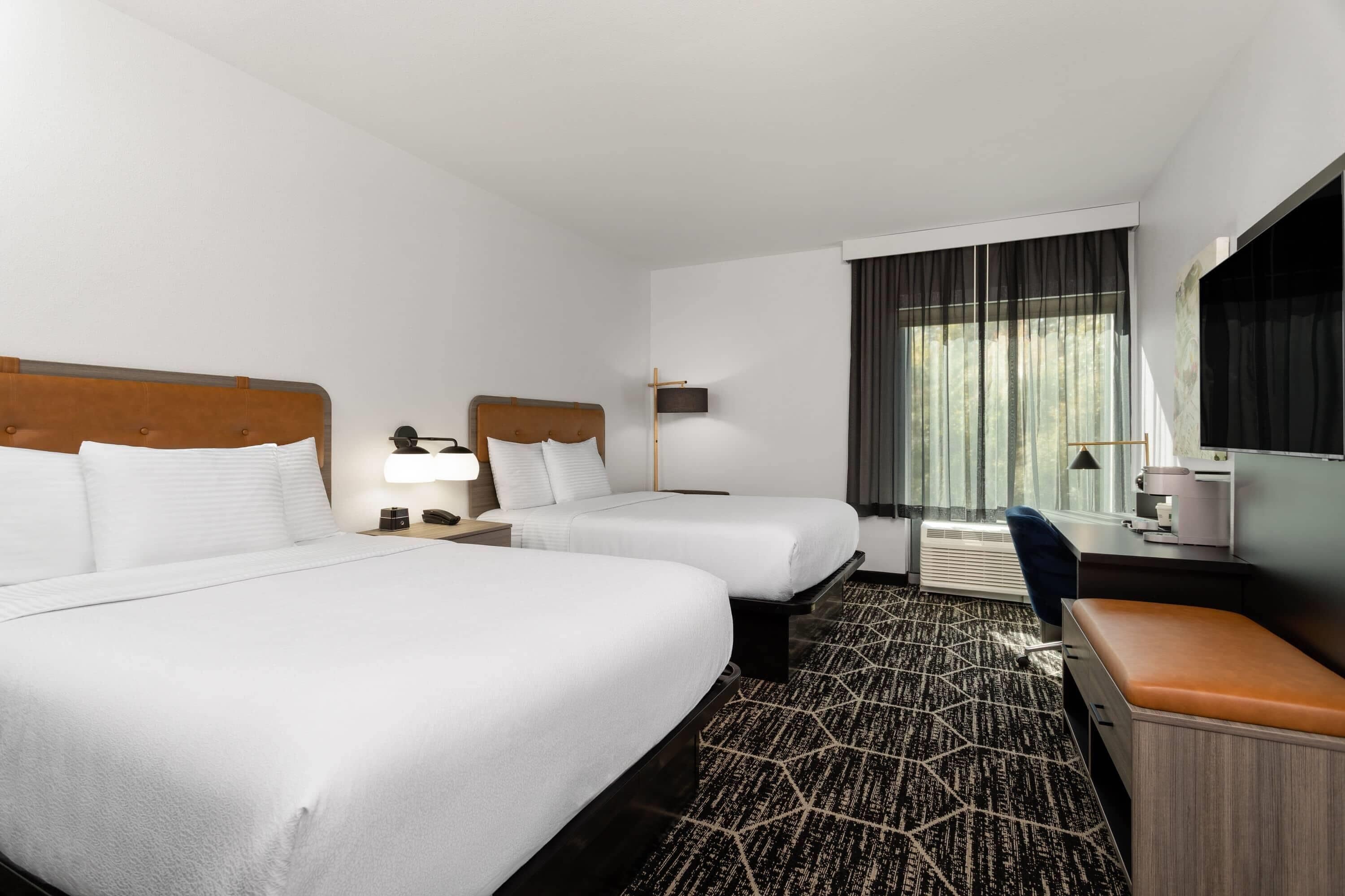 Room, 2 Queen Beds, Non Smoking | Desk, laptop workspace, blackout drapes, iron/ironing board