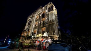A hotel with a sign reading "HOTEL ZORBA" and "ROOM'S BANQUET RESTAURANT". - Treebo Premium Zorba - Hoshangabad Road (Bhopal)