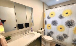 Hair dryer, towels, soap, shampoo