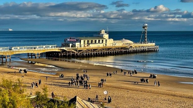 A pier extending into the sea with a building labeled 'KEYWEST' at its end. - Luxury Family Home Central Bournemouth Sleeps 6 (Bournemouth)